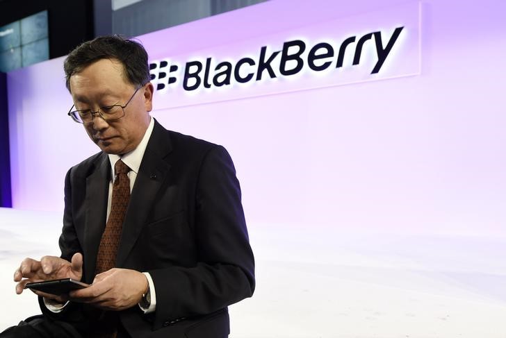 BlackBerry Chief Executive John Chen uses a Passport smartphone following the official launch event in Toronto